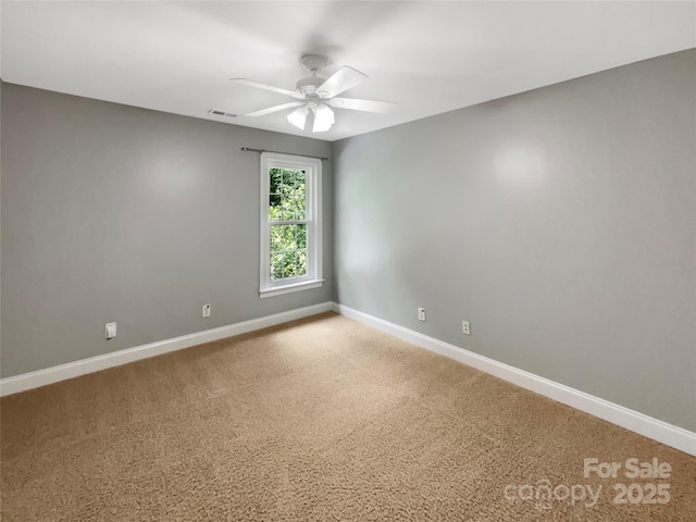 2027 Brook View Ct, Matthews, NC 28104 - empty room with a ceiling fan and light colored carpet