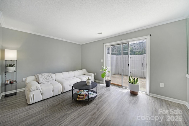 502 Heritage Pkwy, Fort Mill, SC 29715 - living area with crown molding, wood finished floors, and a textured ceiling