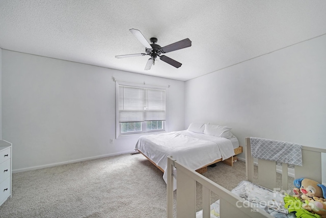502 Heritage Pkwy, Fort Mill, SC 29715 - carpeted bedroom with a textured ceiling and a ceiling fan