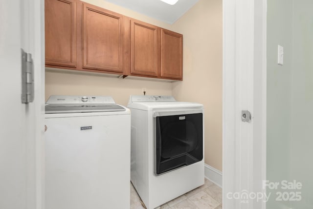 318 W Peeler St, Salisbury, NC 28146 - washroom featuring washer and clothes dryer and cabinet space