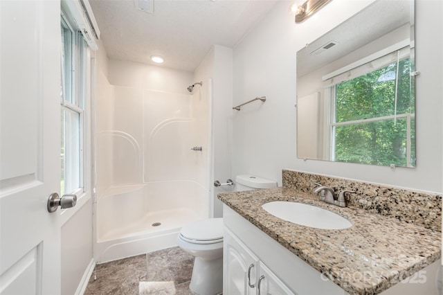 7008 Wannamaker Ln, Charlotte, NC 28226 - full bathroom with walk in shower and vanity