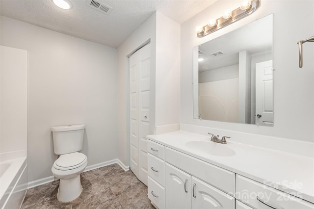 7008 Wannamaker Ln, Charlotte, NC 28226 - full bathroom featuring vanity, a closet, and a textured ceiling