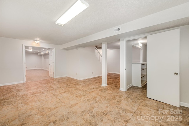 7008 Wannamaker Ln, Charlotte, NC 28226 - finished below grade area featuring stairs and baseboards