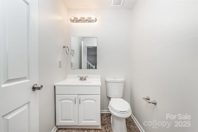 7008 Wannamaker Ln, Charlotte, NC 28226 - half bathroom with vanity and toilet