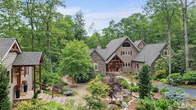 891 Crescent Trl Unit 273, Highlands, NC 28741 - rustic home featuring stone siding, a chimney, and roof with shingles