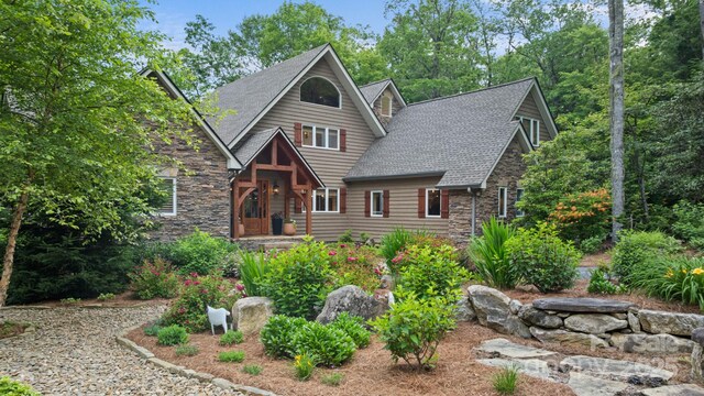 891 Crescent Trl Unit 273, Highlands, NC 28741 - view of front of home with stone siding and roof with shingles