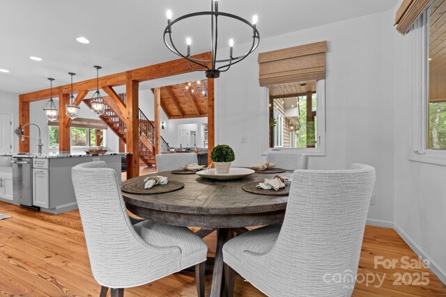 891 Crescent Trl Unit 273, Highlands, NC 28741 - dining area with a chandelier, stairs, light wood finished floors, and recessed lighting