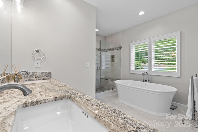 891 Crescent Trl Unit 273, Highlands, NC 28741 - full bathroom with a stall shower, a freestanding bath, recessed lighting, and double vanity