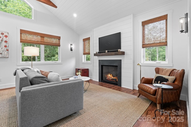 891 Crescent Trl Unit 273, Highlands, NC 28741 - living area featuring wood finished floors, lofted ceiling, a large fireplace, and recessed lighting