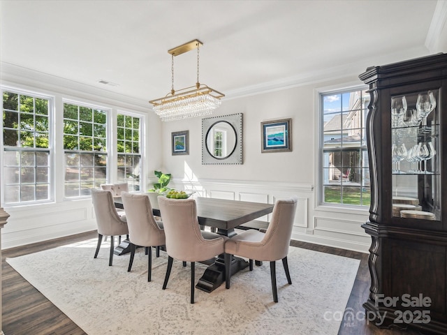 1008 Millbridge Pkwy, Waxhaw, NC 28173 - dining area featuring crown molding and dark wood-type flooring
