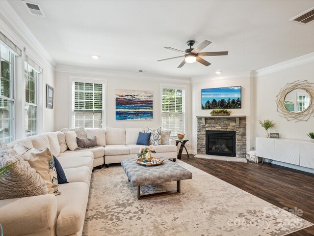 1008 Millbridge Pkwy, Waxhaw, NC 28173 - living room featuring wood finished floors, crown molding, ceiling fan, a fireplace, and recessed lighting