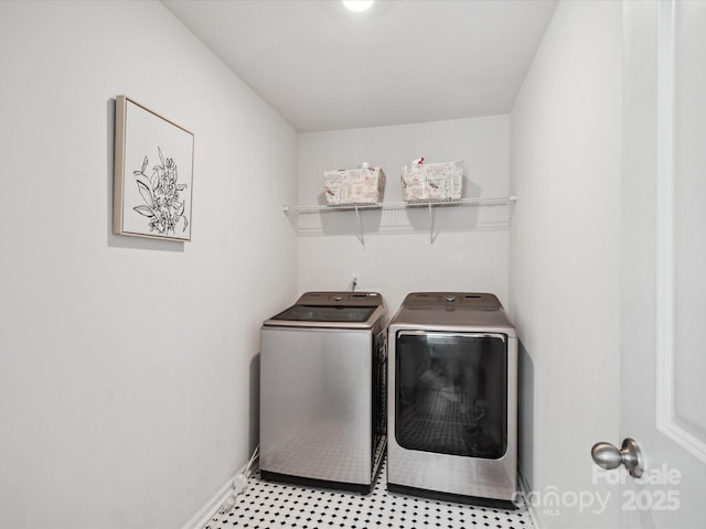 1008 Millbridge Pkwy, Waxhaw, NC 28173 - washroom featuring baseboards and washing machine and clothes dryer