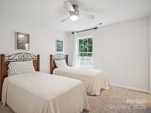 1008 Millbridge Pkwy, Waxhaw, NC 28173 - carpeted bedroom featuring baseboards and a ceiling fan