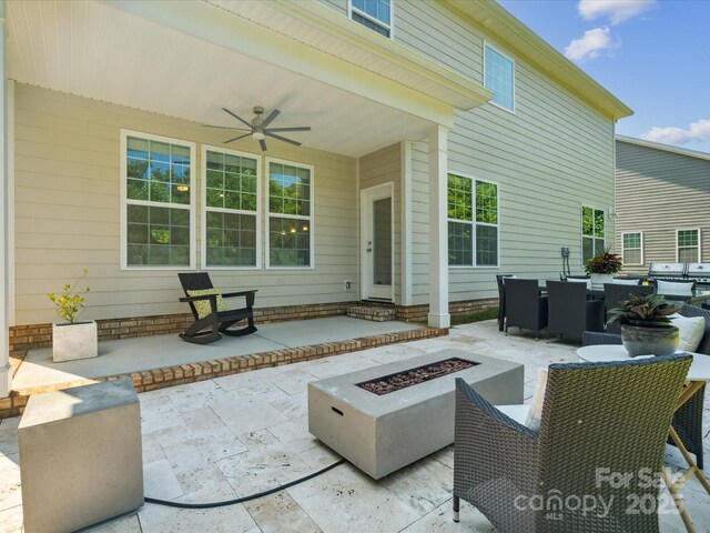 1008 Millbridge Pkwy, Waxhaw, NC 28173 - view of patio / terrace with a fire pit, ceiling fan, and outdoor dining area