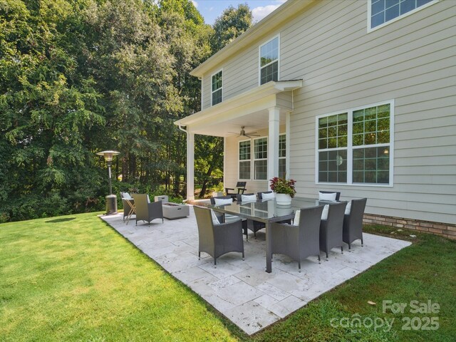 1008 Millbridge Pkwy, Waxhaw, NC 28173 - view of patio / terrace with a ceiling fan and a fire pit
