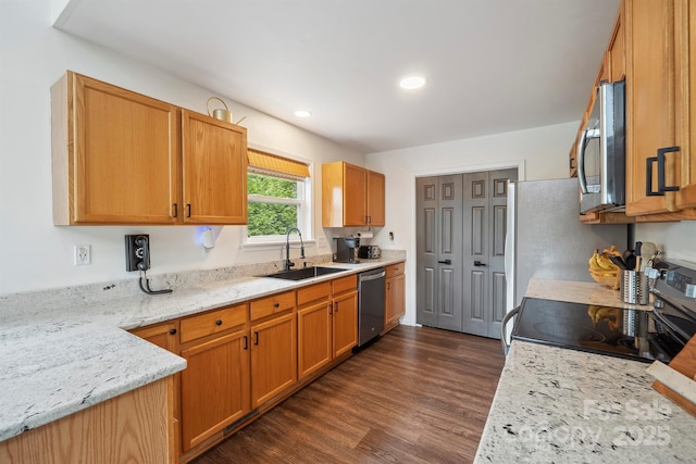 3381 Stones Throw Dr, Valdese, NC 28690 - kitchen with appliances with stainless steel finishes, dark wood-style floors, light stone countertops, and recessed lighting
