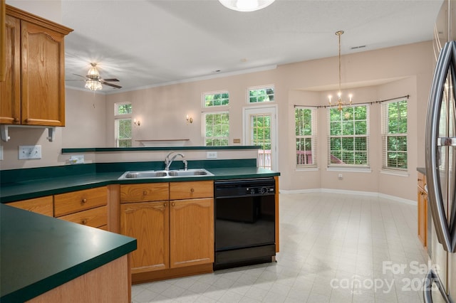 8002 Kingston Dr, Waxhaw, NC 28173 - kitchen with dishwasher, a peninsula, a chandelier, dark countertops, and pendant lighting