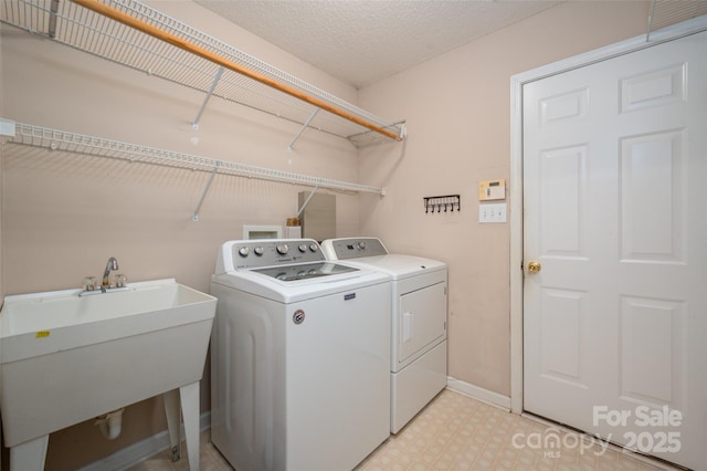 8002 Kingston Dr, Waxhaw, NC 28173 - laundry room with washer and dryer and light floors