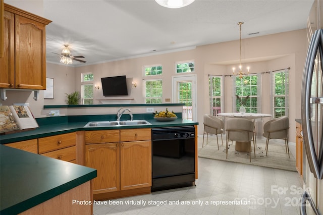 8002 Kingston Dr, Waxhaw, NC 28173 - kitchen with dishwasher, a peninsula, freestanding refrigerator, dark countertops, and a chandelier