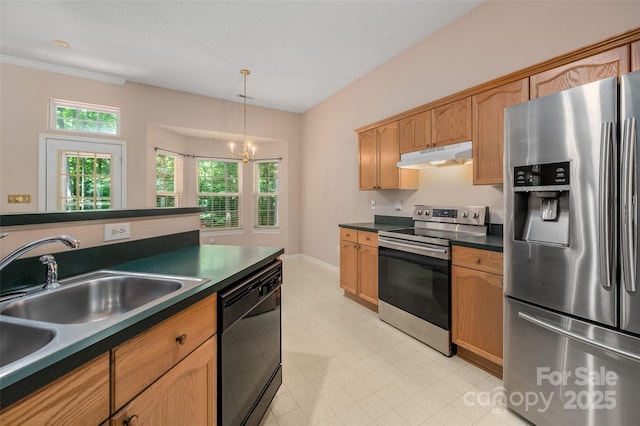 8002 Kingston Dr, Waxhaw, NC 28173 - kitchen featuring stainless steel appliances, under cabinet range hood, dark countertops, a chandelier, and decorative light fixtures