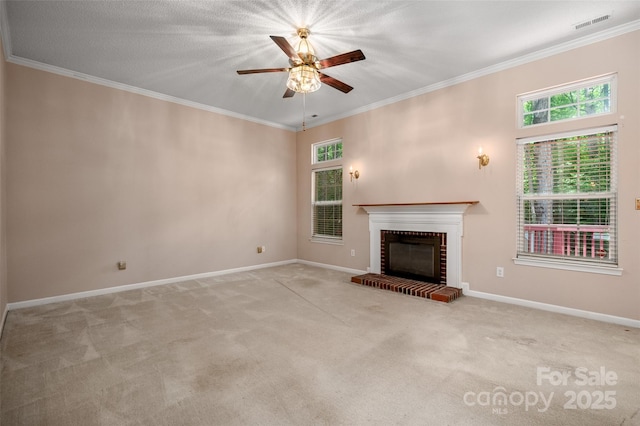 8002 Kingston Dr, Waxhaw, NC 28173 - unfurnished living room with ceiling fan, carpet floors, a fireplace, and crown molding