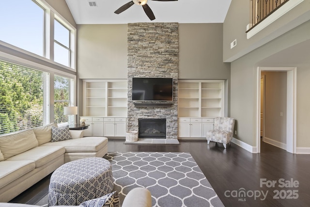 426 Kirkbride Ct, Fort Mill, SC 29715 - living area featuring high vaulted ceiling, a ceiling fan, dark wood-style flooring, and a stone fireplace