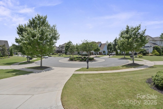 426 Kirkbride Ct, Fort Mill, SC 29715 - view of property's community with curved driveway, a residential view, and a yard