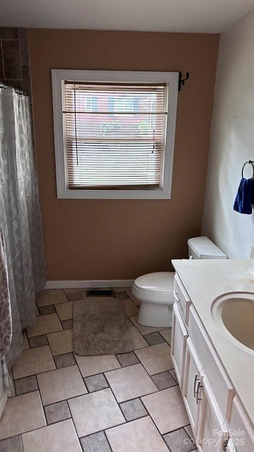 1010 Sprucewood St, Kannapolis, NC 28081 - bathroom featuring vanity and a shower with shower curtain