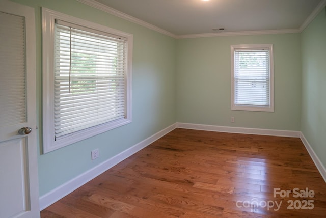 4879 Denton Chapel Rd, Morganton, NC 28655 - unfurnished room featuring ornamental molding and wood finished floors