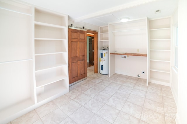 4879 Denton Chapel Rd, Morganton, NC 28655 - interior space with electric water heater, a barn door, and hookup for an electric dryer