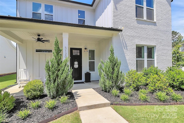 5129 Whitman Ave, Matthews, NC 28105 - property entrance with board and batten siding, a ceiling fan, and covered porch