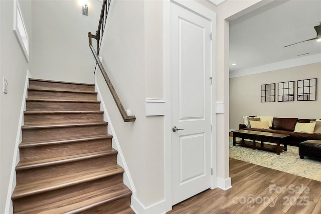 5129 Whitman Ave, Matthews, NC 28105 - stairway with wood finished floors, ornamental molding, and recessed lighting