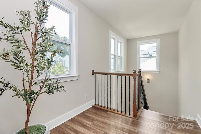 5129 Whitman Ave, Matthews, NC 28105 - stairway featuring healthy amount of natural light and wood finished floors