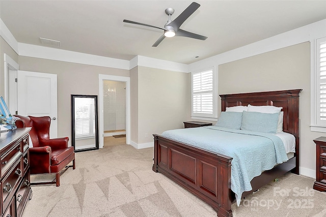 5129 Whitman Ave, Matthews, NC 28105 - bedroom featuring light carpet, a ceiling fan, and connected bathroom