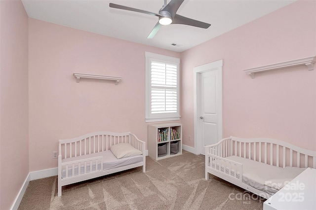 5129 Whitman Ave, Matthews, NC 28105 - carpeted bedroom featuring ceiling fan and a crib
