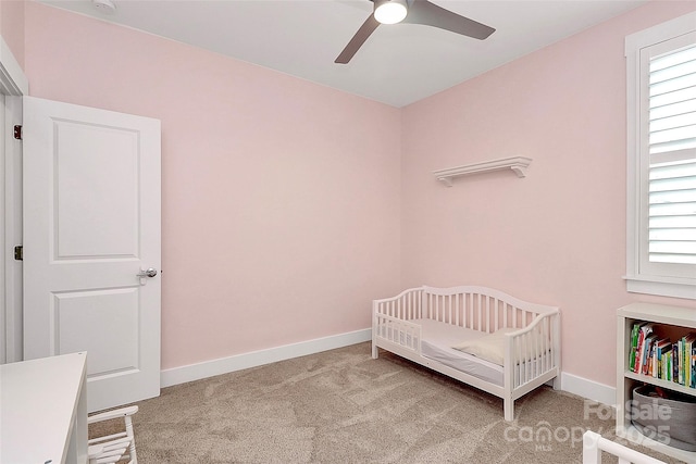 5129 Whitman Ave, Matthews, NC 28105 - carpeted bedroom featuring a nursery area, multiple windows, and ceiling fan