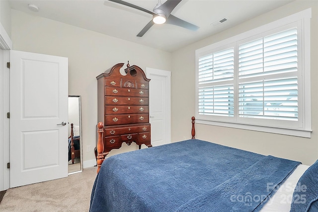 5129 Whitman Ave, Matthews, NC 28105 - bedroom with light colored carpet and a ceiling fan