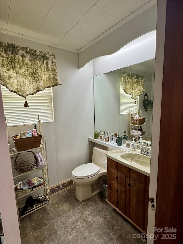 300 Blackmon St S, Bethune, SC 29009 - bathroom with crown molding, vanity, and tile patterned flooring