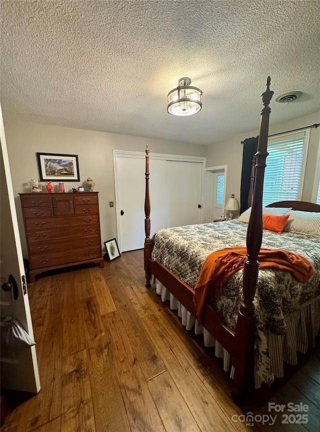 300 Blackmon St S, Bethune, SC 29009 - bedroom featuring hardwood / wood-style floors and a textured ceiling