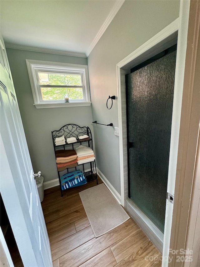 300 Blackmon St S, Bethune, SC 29009 - bathroom featuring crown molding and wood finished floors