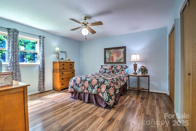 4004 Stillwater Ct, York, SC 29745 - bedroom with wood finished floors, a textured ceiling, a closet, and ceiling fan