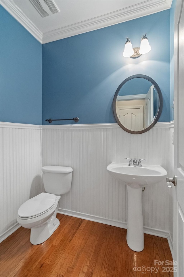 1812 Mill Chase Ln, Waxhaw, NC 28173 - bathroom with a wainscoted wall, wood finished floors, and ornamental molding
