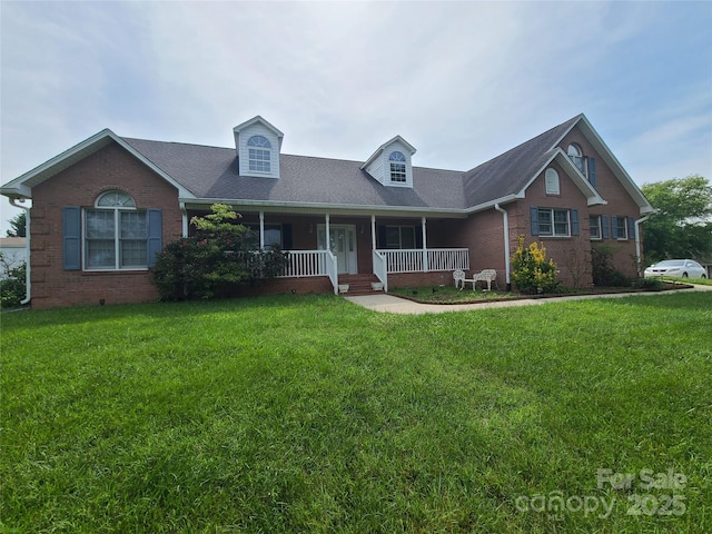110 Kimberly Ln, Kings Mountain, NC 28086 - view of front of property featuring a porch, a front yard, and brick siding