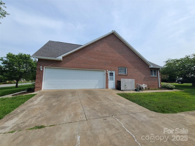110 Kimberly Ln, Kings Mountain, NC 28086 - view of side of home with brick siding, driveway, a yard, a garage, and a shingled roof