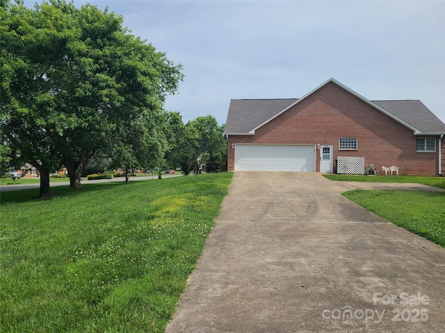 110 Kimberly Ln, Kings Mountain, NC 28086 - view of property exterior featuring brick siding, driveway, and a yard