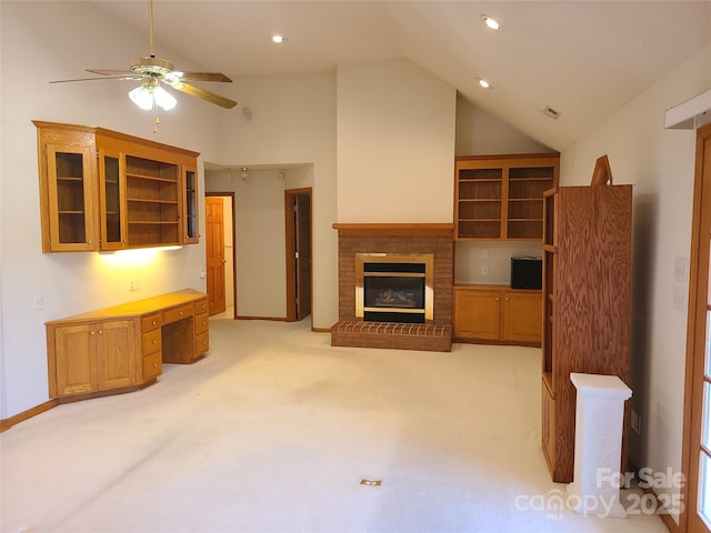 110 Kimberly Ln, Kings Mountain, NC 28086 - unfurnished living room featuring ceiling fan, high vaulted ceiling, light colored carpet, a brick fireplace, and recessed lighting