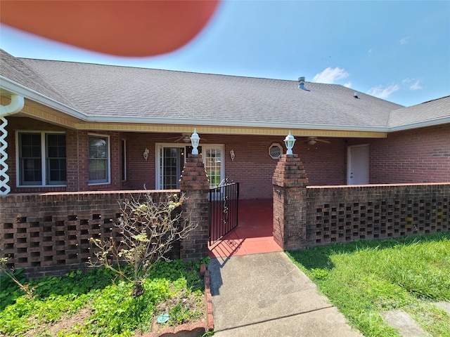 110 Kimberly Ln, Kings Mountain, NC 28086 - property entrance with ceiling fan, roof with shingles, and brick siding