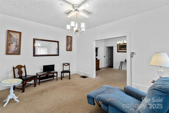 23 Oteen Park Pl, Asheville, NC 28805 - living area with a chandelier, carpet flooring, a textured ceiling, and ceiling fan