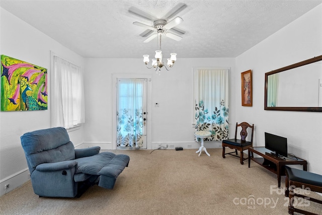 23 Oteen Park Pl, Asheville, NC 28805 - sitting room featuring ceiling fan, carpet, a chandelier, and a textured ceiling
