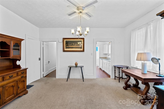 23 Oteen Park Pl, Asheville, NC 28805 - carpeted home office with a chandelier, ceiling fan, and plenty of natural light